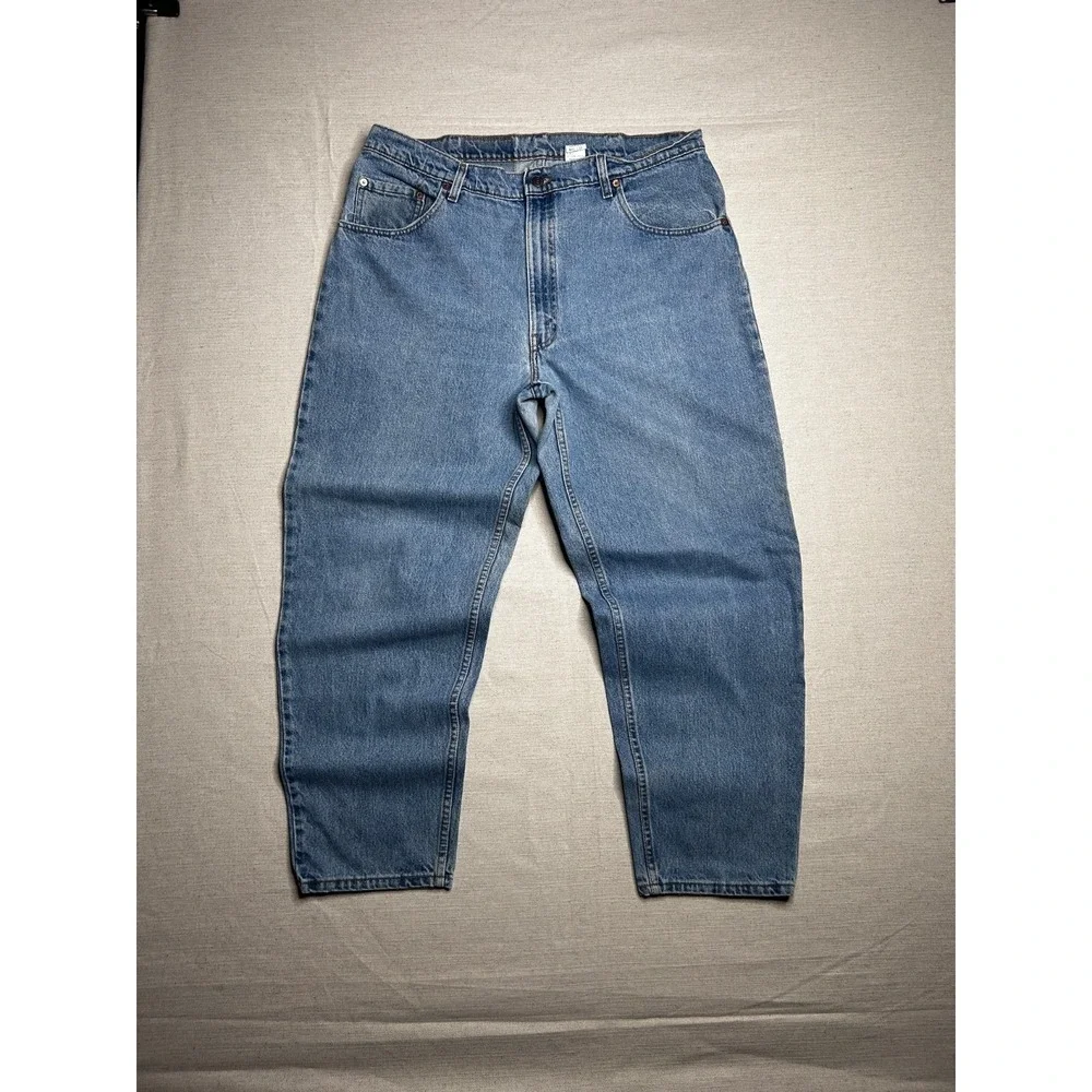 Vintage Levi's 560 Loose Fit Jeans Men's 40x30 USA Made Tapered Leg Light Wash